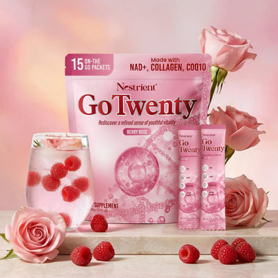 Nestrient GoTwenty youthful vitality powdered drink mix in berry rose flavor with NAD+, collagen, and CoQ10, shown in a glass.